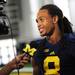 Michigan senior cornerback J.T. Floyd smiles as he answers questions  during media day at the Al Glick Field House on Sunday afternoon. Melanie Maxwell I AnnArbor.com